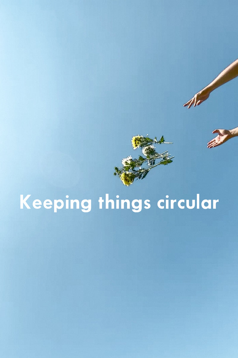 Deidei hands throwing flowers in the air with keeping things circular written across 