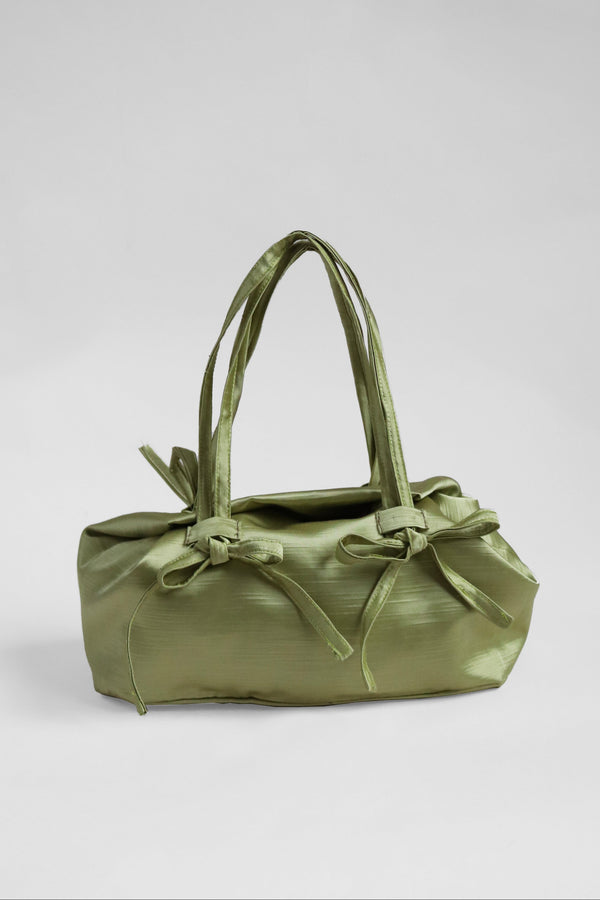 Green handbag with bow detailing 