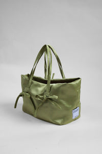 Green tote bag with bow details and Deidei brand label 