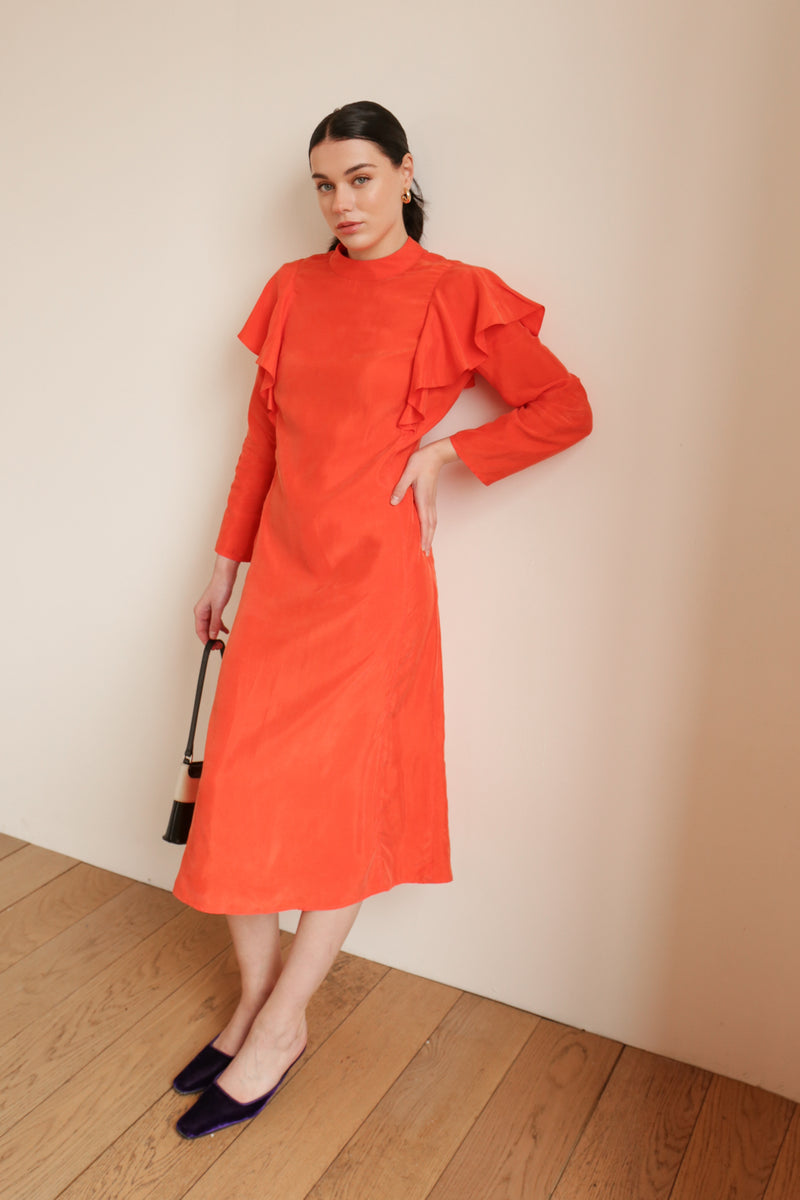 sustainable midi dress in orange cupro with cut out to the back