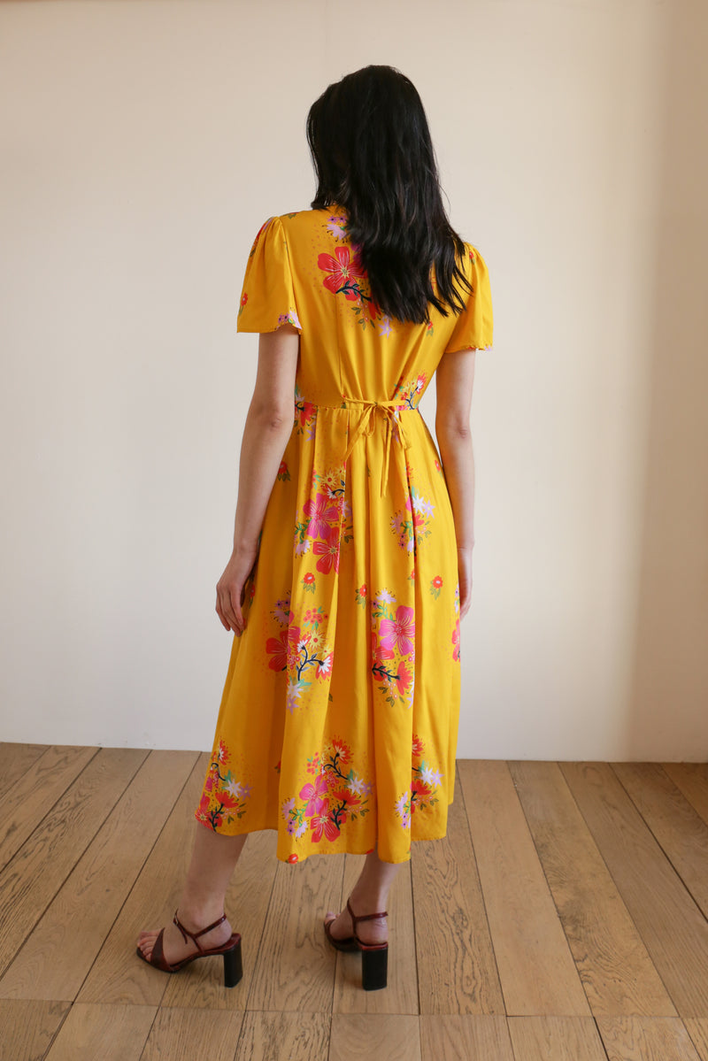 deidei sustainable midi dress in yellow floral print bamboo